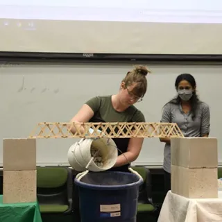 Laela Oullette and Chris Bove win the 2021 Saint Leo University Physics Program Bridge Competition